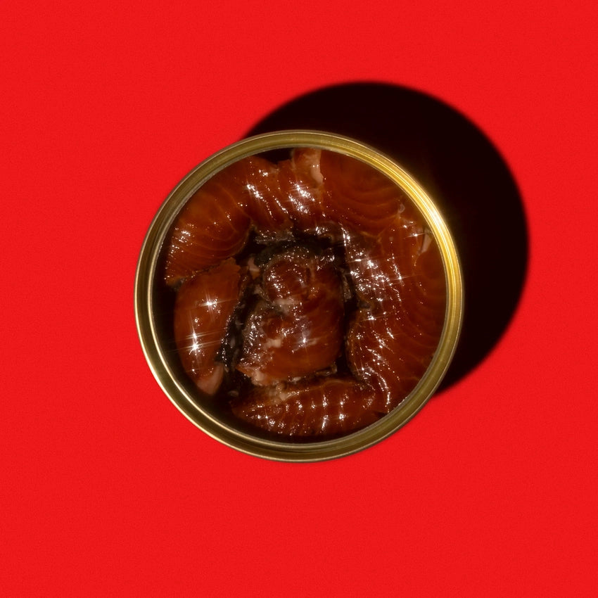 Wildfish Cannery Smoked King Salmon on a red background