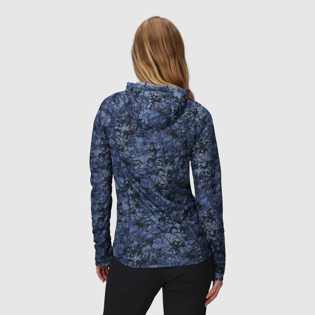 Woman wearing an Outdoor Research Women's Echo Hoodie in Fjord Granite Print on a white background