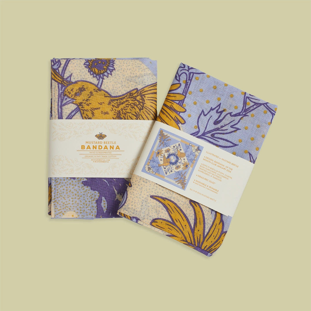 Mustard Beetle Bandana of the Month Club bandana on a neutral background.