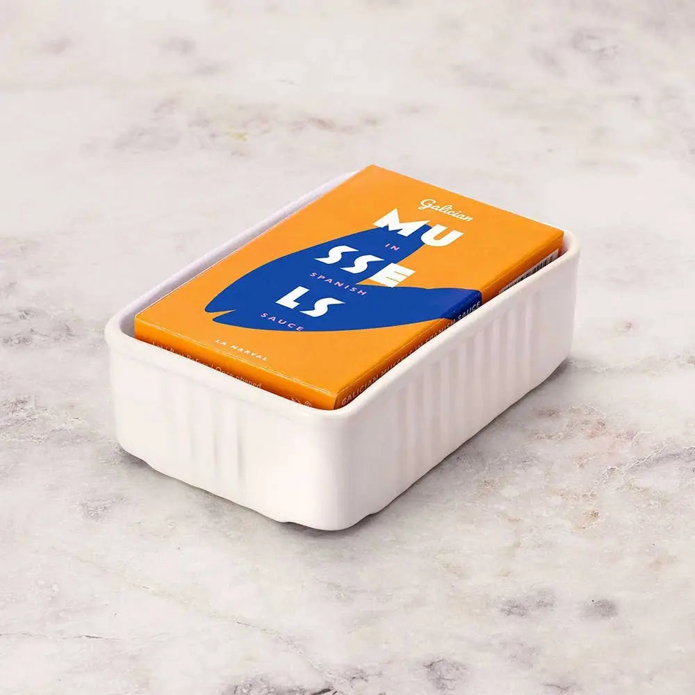 La Narval Ceramic Tin Holder holding mussels on a neutral background.