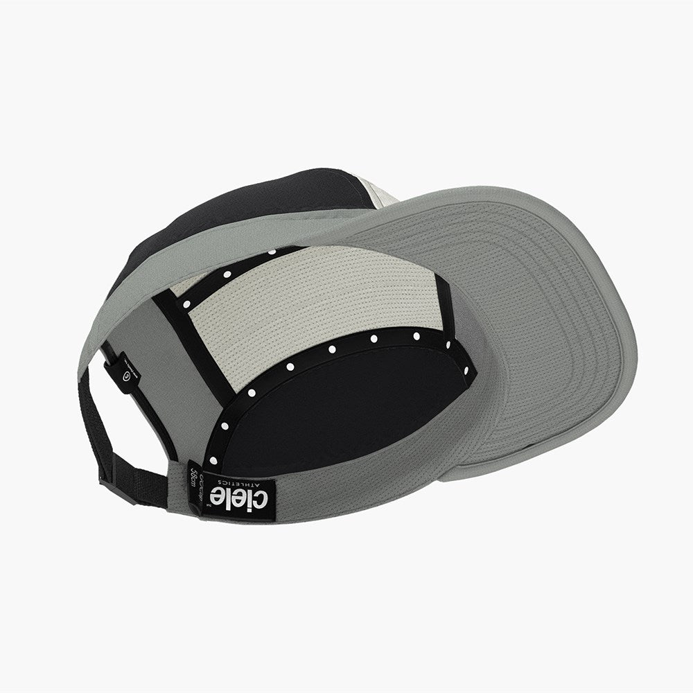 A Ciele GOCap in a vibrant shade, showcasing its sleek design with a breathable material and reflective logo, perfectly suited for day and night running.