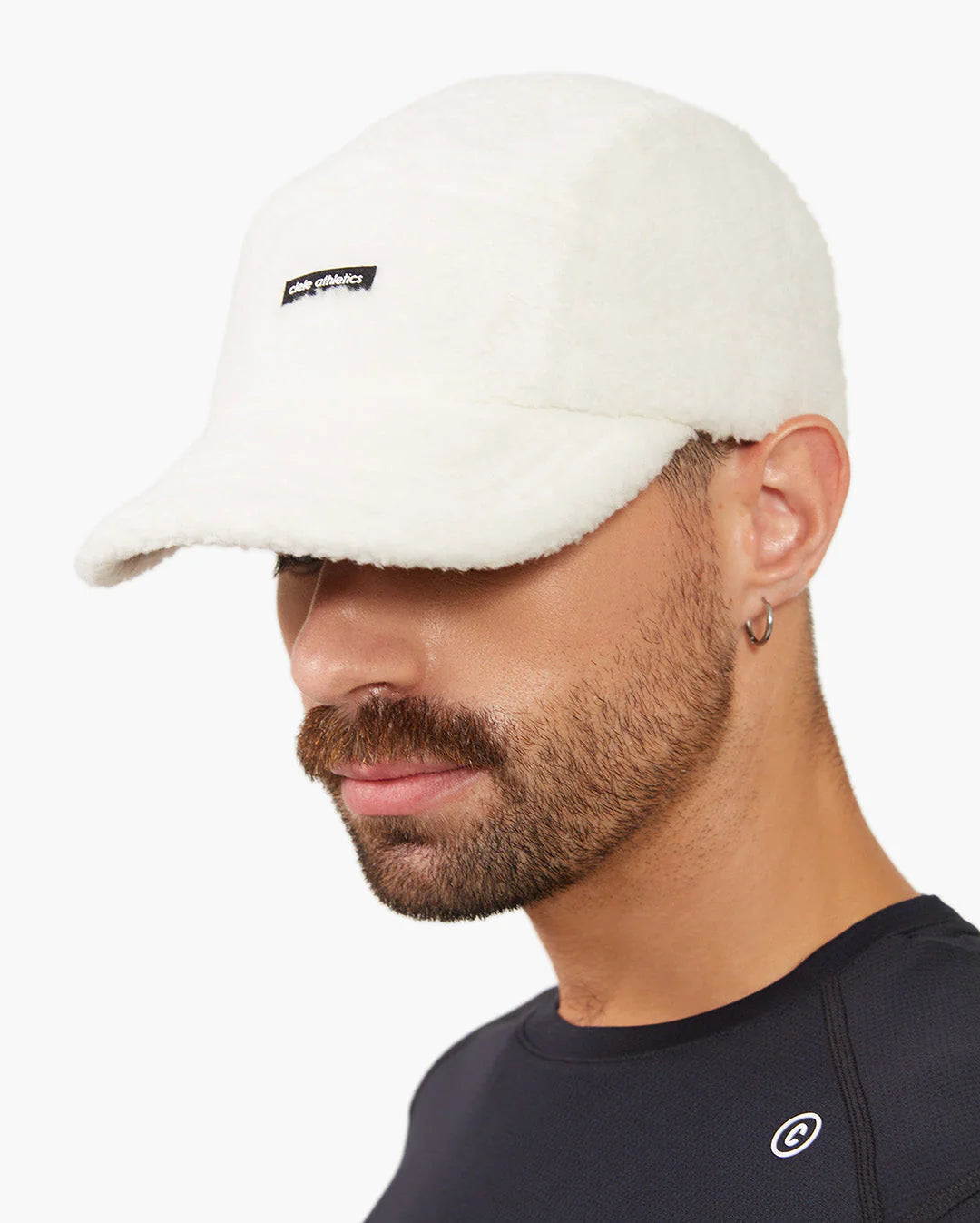 Ciele GOCap Sherpa fleece hat in Trooper worn by a man on a neutral background.