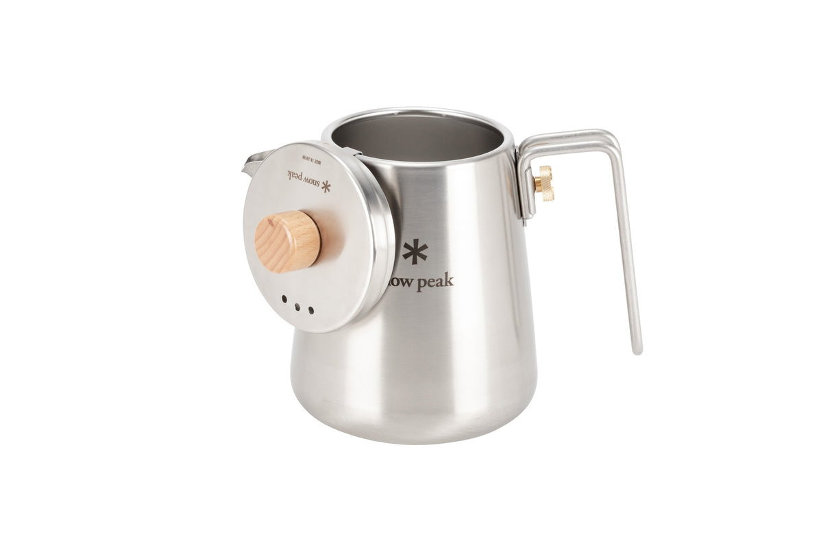 Snow Peak Field Barista Kettle for camp coffee on a neutral background.