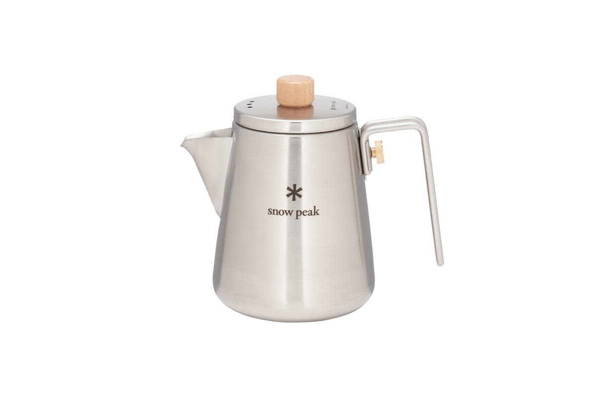 Snow Peak Field Barista Kettle for camp coffee on a neutral background.