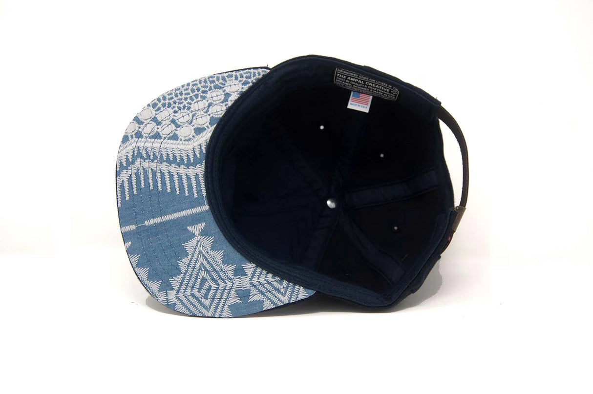 Blue and white patterned Ampal Creative Chimayo Strapback Hat on a white background