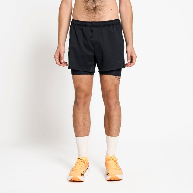 Ciele Athletics M DLYShort 5" Long Brief Short men's running shorts in Shadowcast worn by a man on a neutral background.