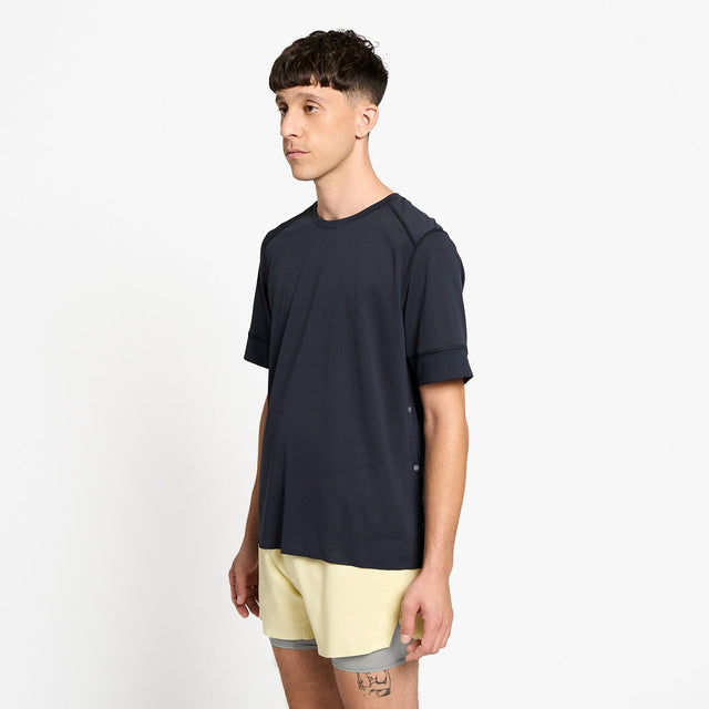 Ciele Athletics M FSTTShirt men's running shirt in Shadowcast worn by a man on a neutral background.