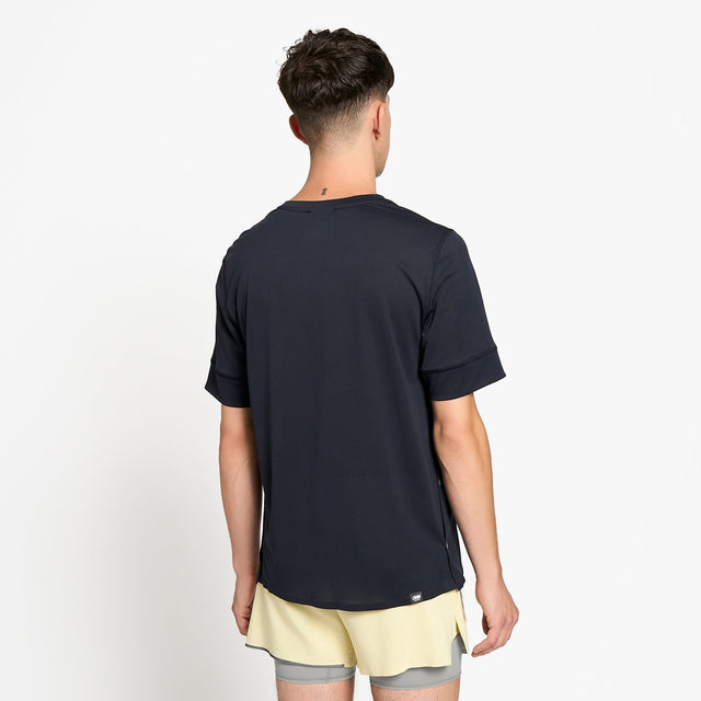 Ciele Athletics M FSTTShirt men's running shirt in Shadowcast worn by a man on a neutral background.