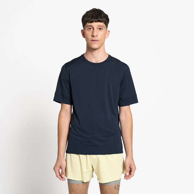Ciele Athletics M FSTTShirt men's running shirt in Deep Space worn by a man on a neutral background.