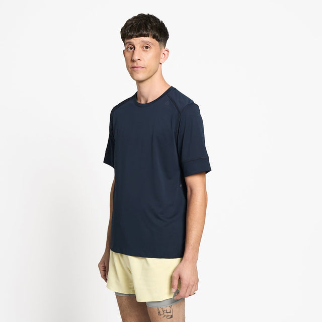 Ciele Athletics M FSTTShirt men's running shirt in Deep Space worn by a man on a neutral background.