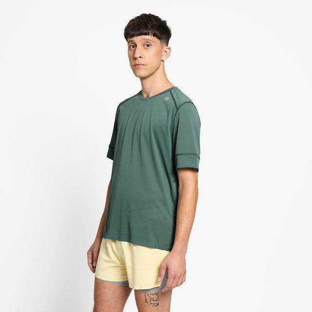 Ciele Athletics M FSTTShirt men's running shirt in Silver Pine worn by a man on a neutral background.