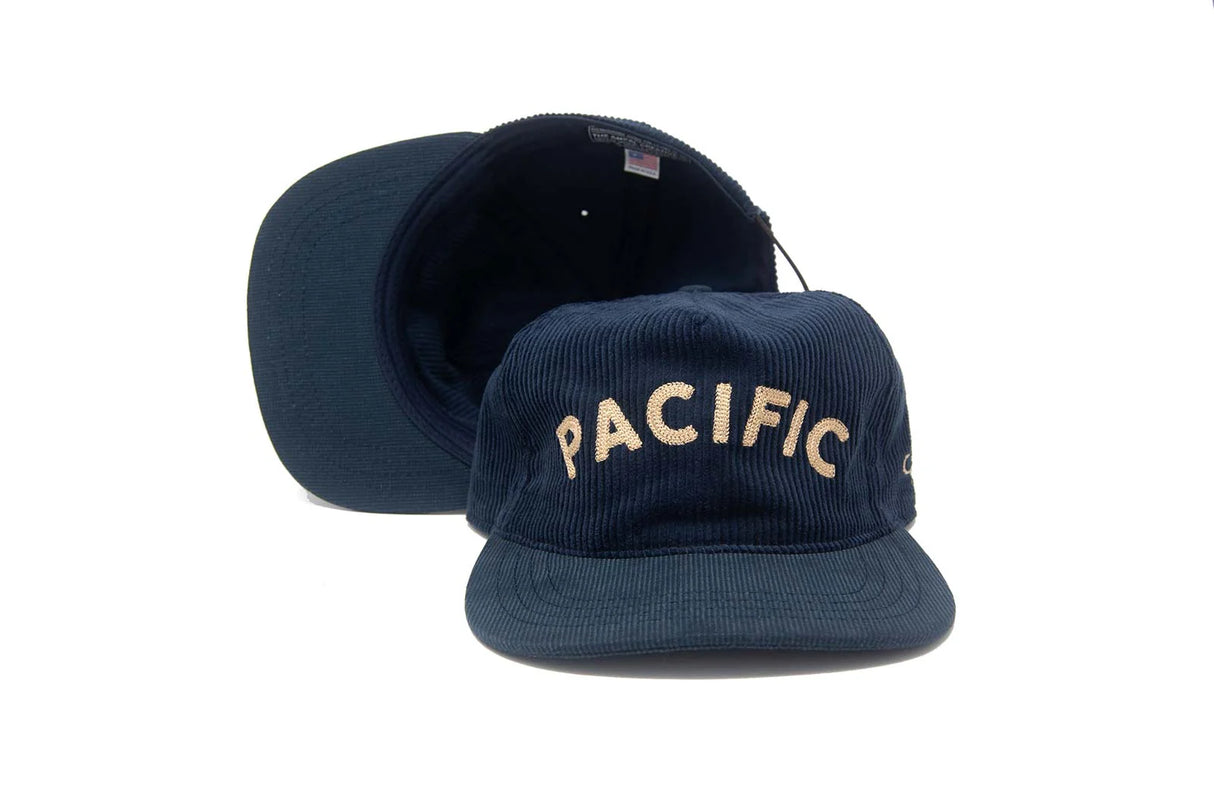 Navy blue Ampal Creative Pacific III Cord Strapback Hat with 'PACIFIC' text on a white background