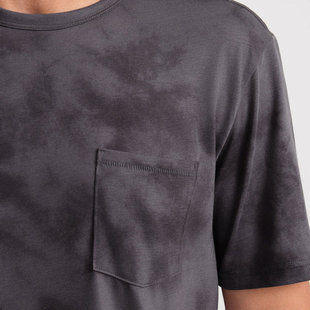 Roark Mathis Active Tie Dye Pocket Short Sleeve Tee in Gray on a gray background