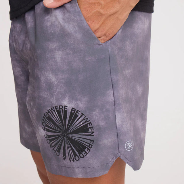 Roark Serrano 7" Active Stretch Shorts in Shark with a black circular design and text on a white background