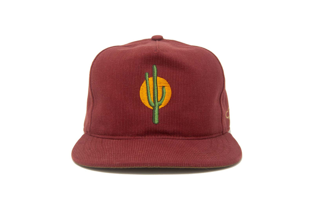 Red Ampal Creative Sunset Cactus Cord Strapback Hat with cactus and sun design on a white background