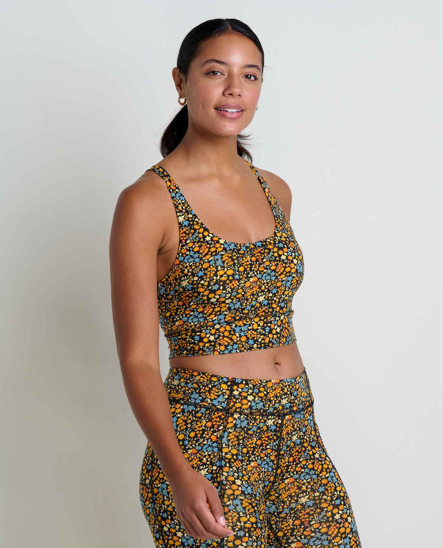 Toad&Co Terrane Longline Bralette sports bra in Black Ditsy Print on a neutral background.