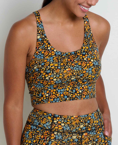 Toad&Co Terrane Longline Bralette sports bra in Black Ditsy Print on a neutral background.