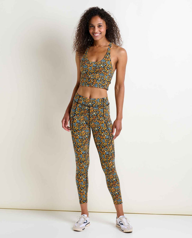 Toad&Co Terrane Longline Bralette sports bra in Black Ditsy Print on a neutral background.