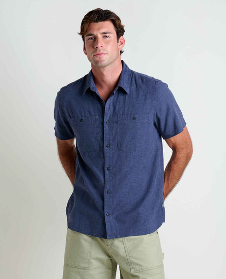 Toad&Co Men's Taj Hemp Short Sleeve Shirt in True Navy worn by a man.