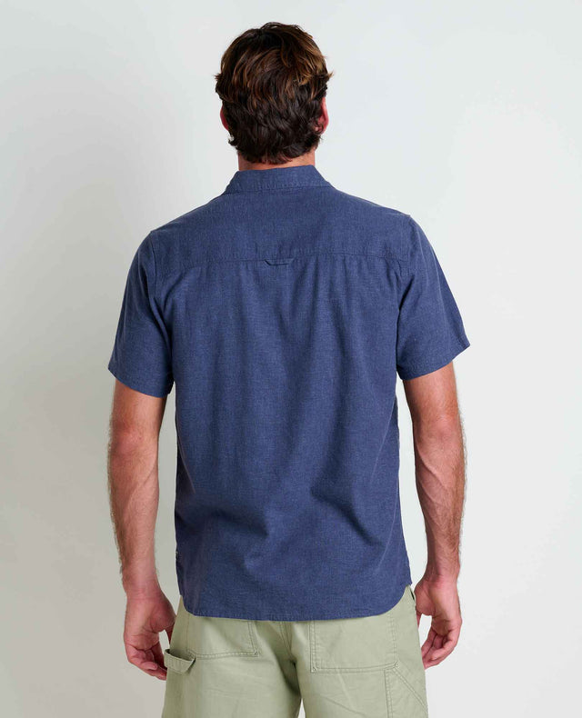Toad&Co Men's Taj Hemp Short Sleeve Shirt in True Navy worn by a man.