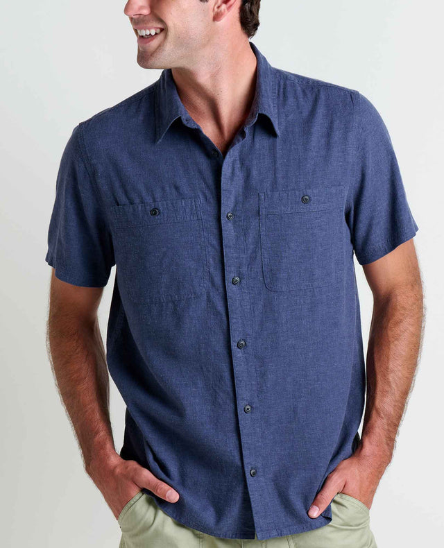 Toad&Co Men's Taj Hemp Short Sleeve Shirt in True Navy worn by a man.