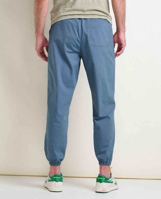 Toad&Co Men's Boundless Jogger in Ink worn by a runner on a neutral background.
