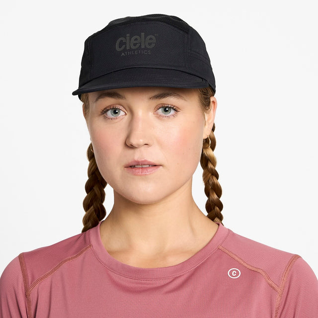 Ciele Athletics GOCap Classic Athletics running hat in Shadowcast worn by a woman on a neutral background.