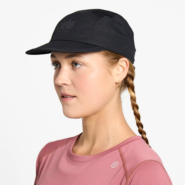 Ciele Athletics GOCap Classic Athletics running hat in Shadowcast worn by a woman on a neutral background.