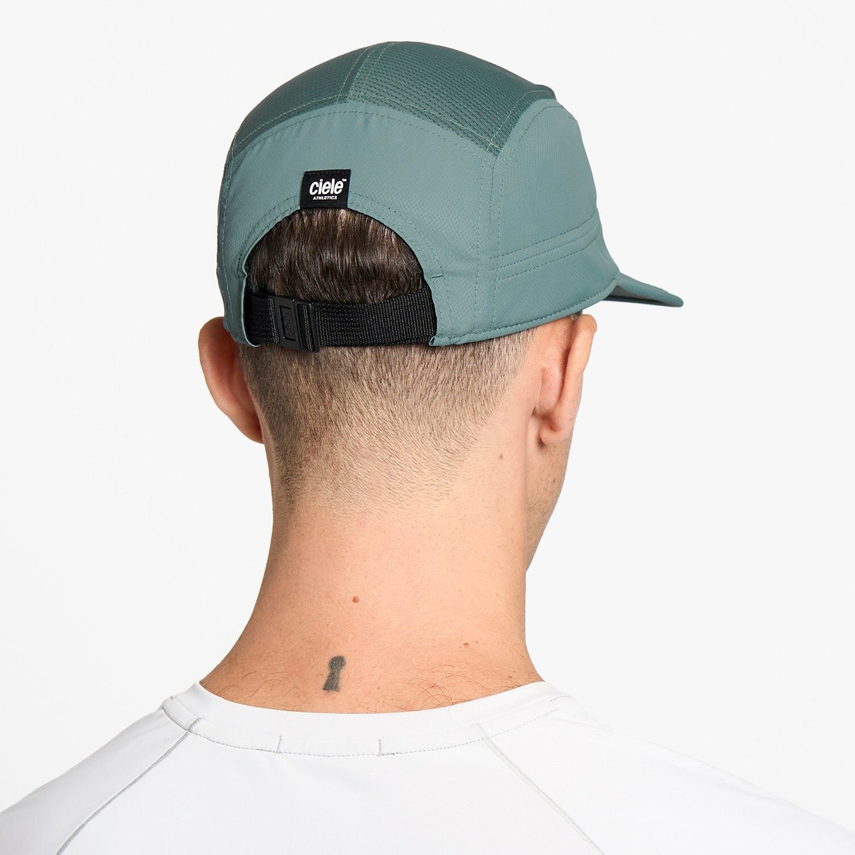 Ciele Athletics GOCap Classic Athletics running hat in Silver Pine worn by a man on a neutral background.