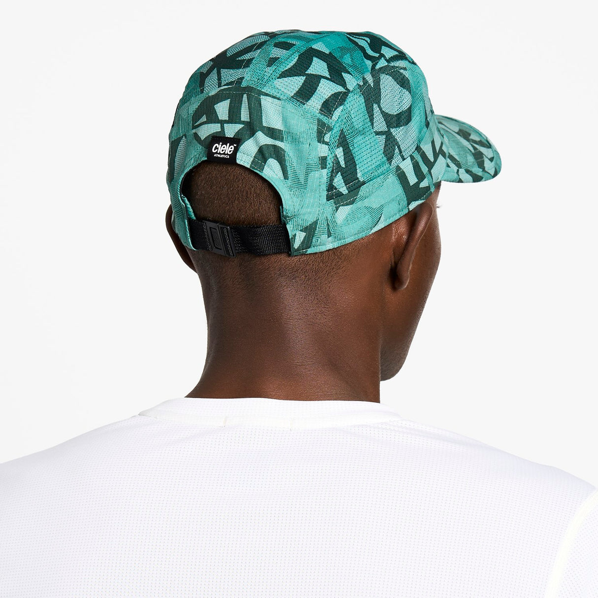 Ciele Athletics GOCap SC Field Loopy MU running hat in Dusty Turquoise worn by a man on a neutral background.