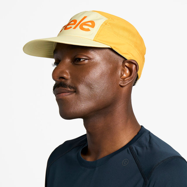 Ciele Athletics GOCap Comp Century running hat in Glade worn by a man on a neutral background.