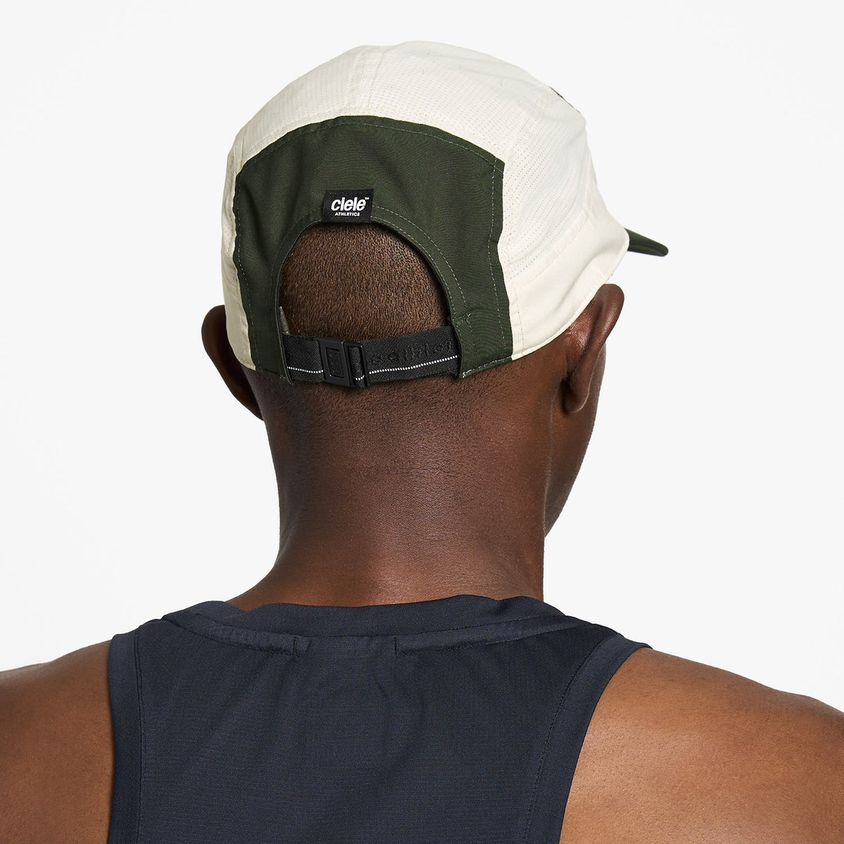 Ciele Athletics GOCap Comp Century running hat in Seaweed/Rainy Day worn by a man on a neutral background.
