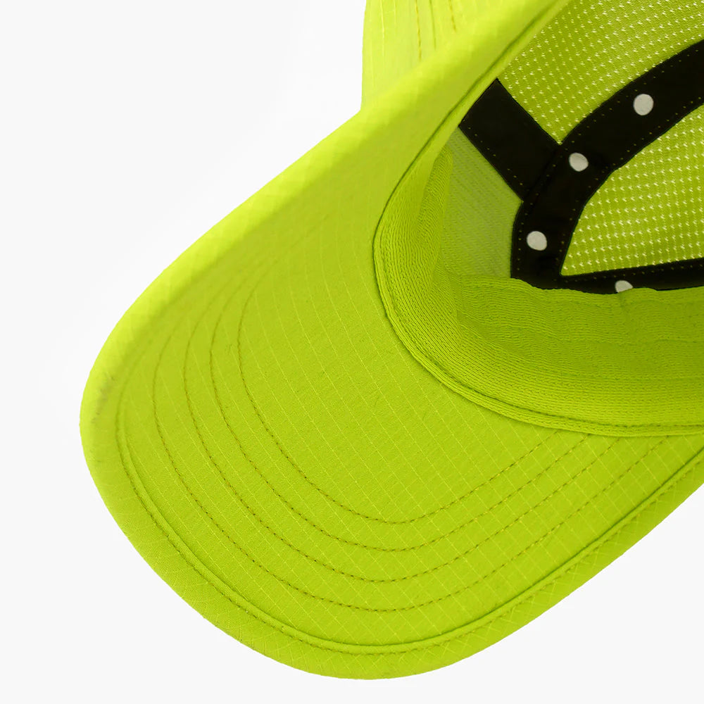 Close-up of a ciele athletics GOCap SC Field - Capital RC running hat in Lime Green on a white background