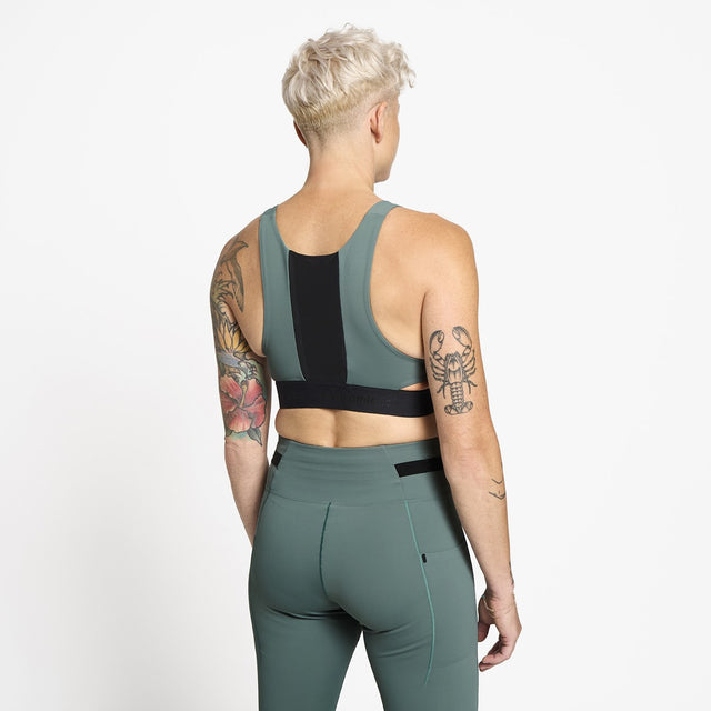 Ciele Athletics W QCKBra women's running bra in Silver Pine worn by a woman on a neutral background.