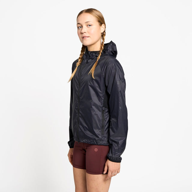 Ciele Athletics W VNTJacket women's running jacket in Shadowcast worn by a woman on a neutral background.