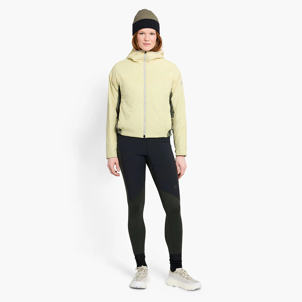 Person wearing a ciele UHBeanie fleece running beanie in Canvas on a white background