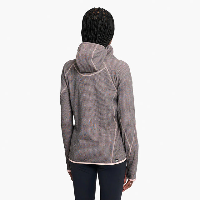 Person wearing a Ciele Athletics Women's IBTHoody - Fleece Running Hoodie in Peachskin on a white background