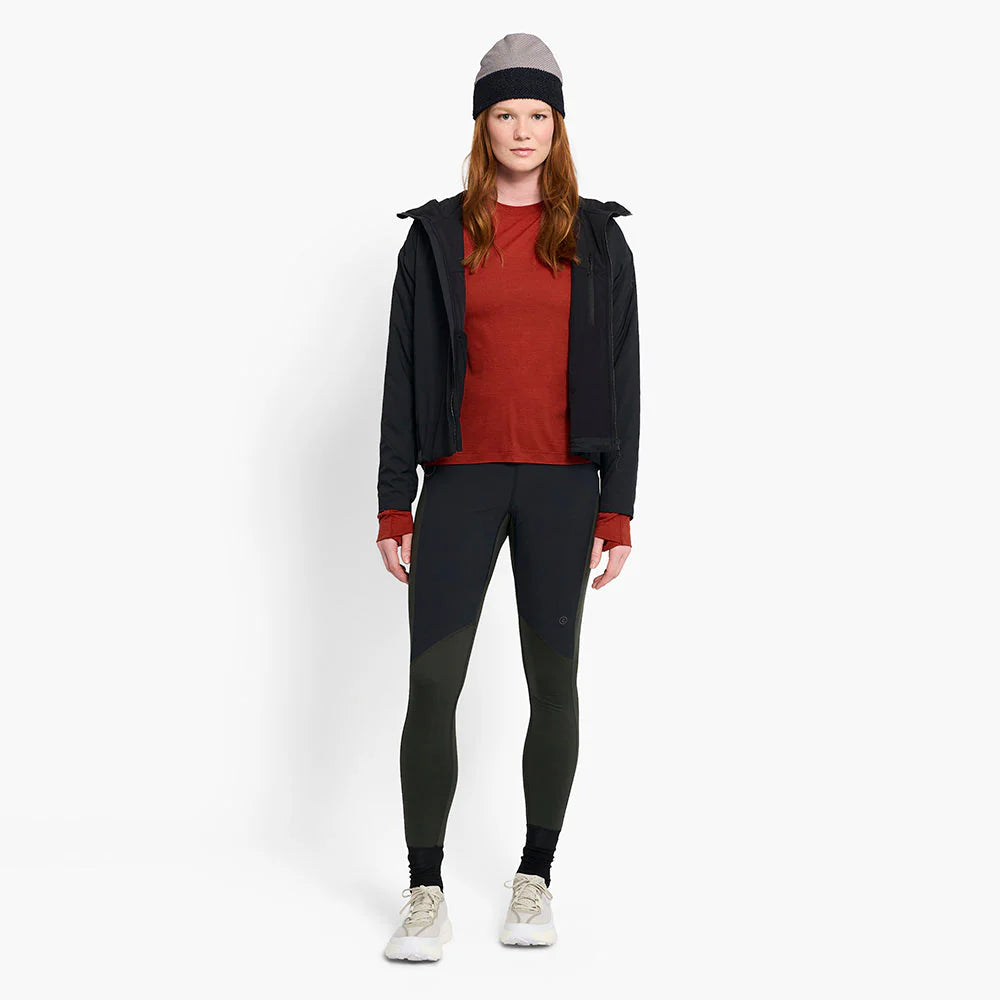 Person wearing a ciele UHBeanie fleece running beanie in Peachskin on a white background