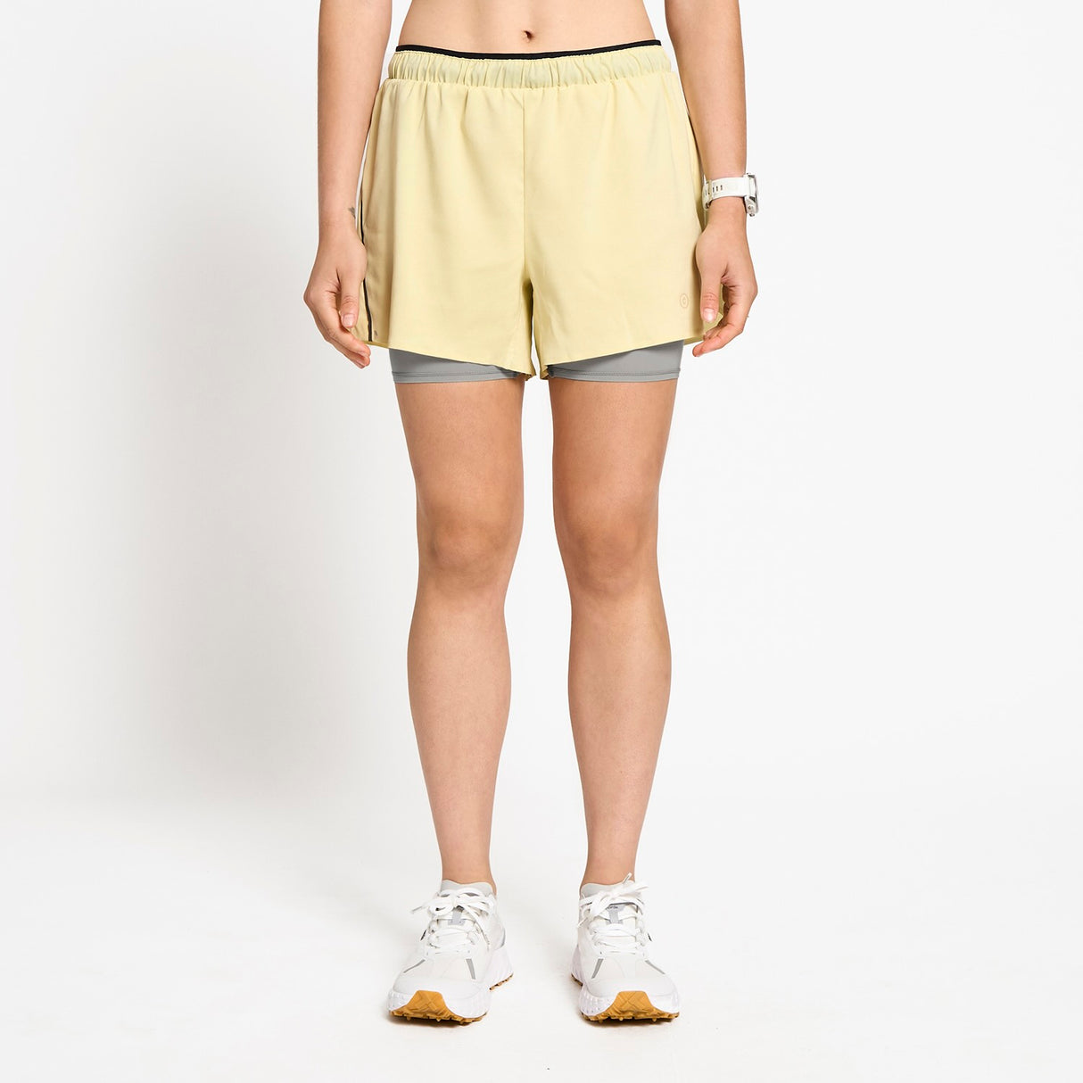 Ciele Athletics W DLYShort 4" Long Brief women's running shorts in Glade worn by a woman on a neutral background.