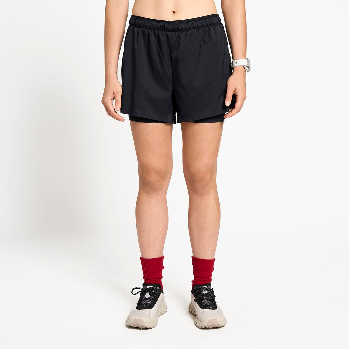 Ciele Athletics W DLYShort 4" Long Brief women's running shorts in Shadowcast worn by a woman on a neutral background.