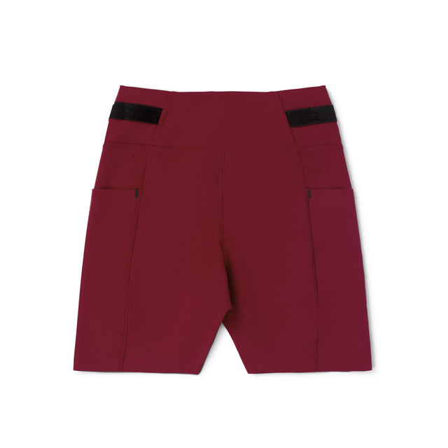 Ciele Athletics Women's FSTTight Short 7" in Crimson Red with black accents on a white background