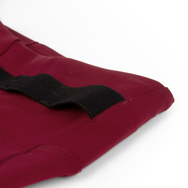 Ciele Athletics Women's FSTTight Short 7" in Crimson Red with black elastic band on a white background