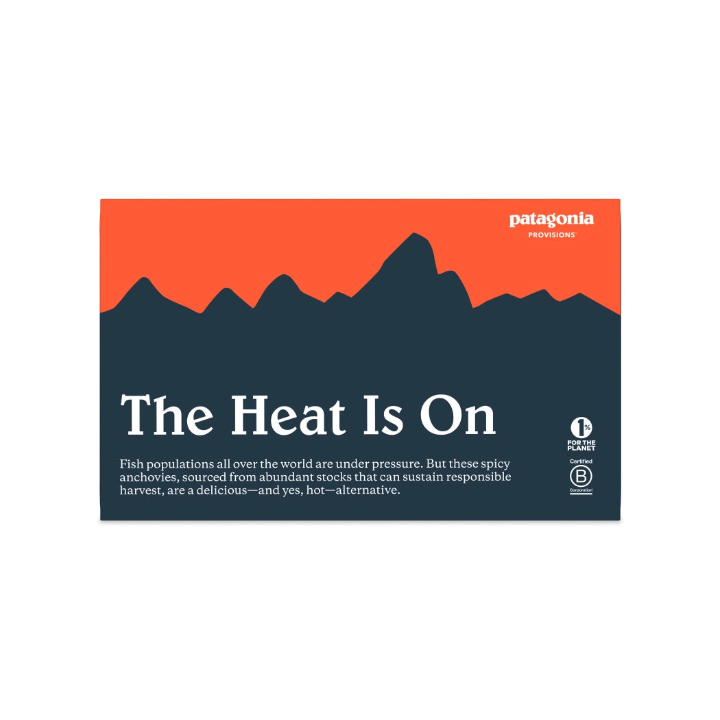 Patagonia Spicy White Anchovies product packaging with mountain design and text 'The Heat Is On' on a white background