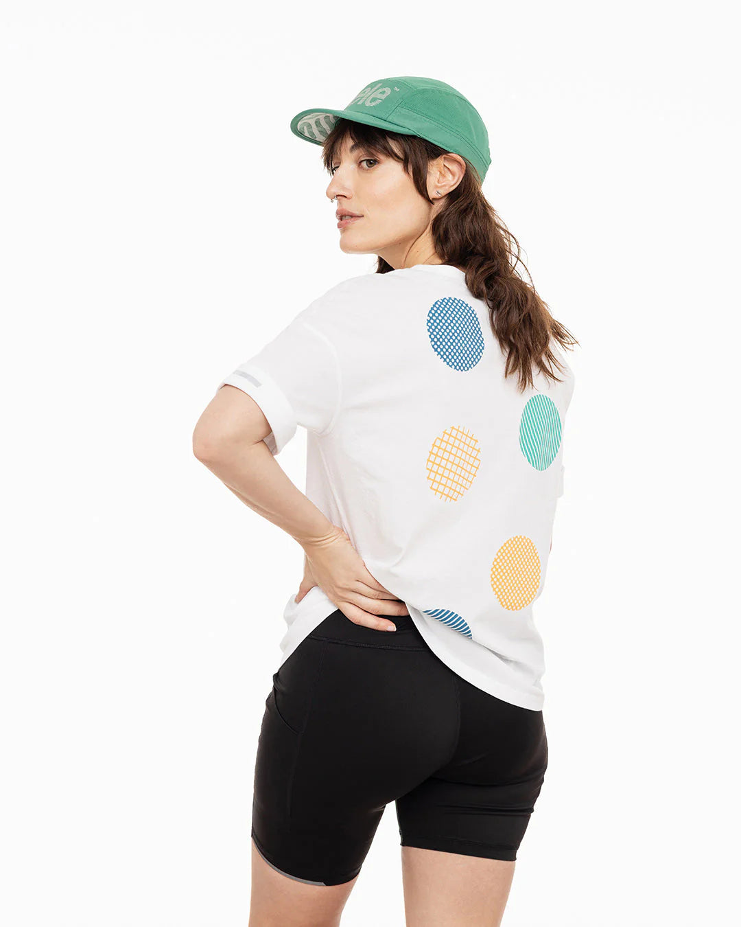 Ciele Athletics W FSTTight Short 6" in Shadowcast worn by a woman from the rear on a neutral background.