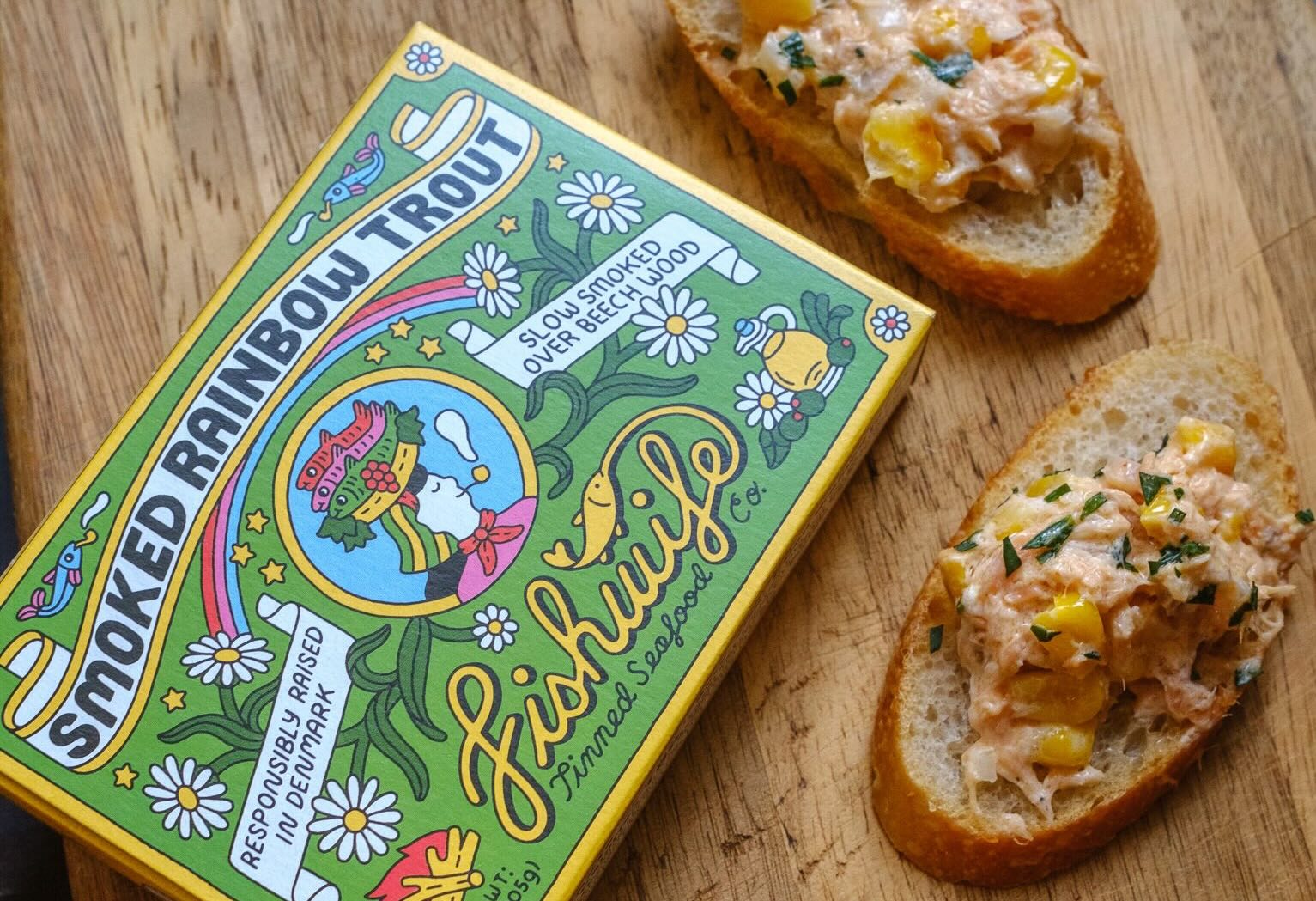 Fishwife Smoked Rainbow Trout tinned fish with bread topped with summer smoked trout dip