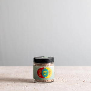 JSC x Fly By Jing Tingly Sichuan Salt on a light surface with a gray background