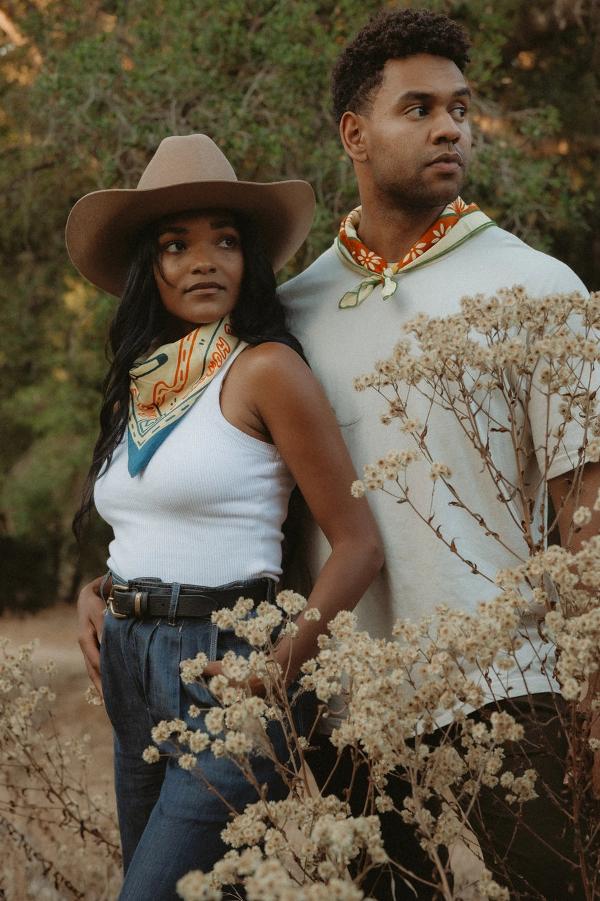 Bandits Grab The Horns bandana worn by people outdoors.