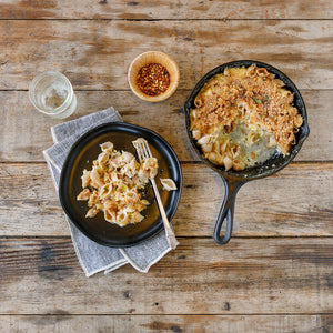 Patagonia Provisions Organic Pasta Shells 12oz Box baked in a mac and cheese on a wood background.