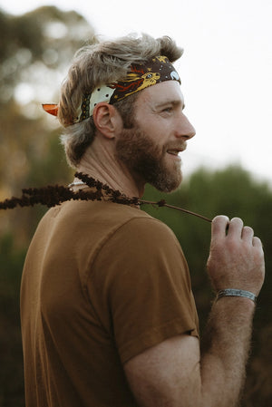 Bandits Creatures of the Night Bandana worn by a man outdoors.