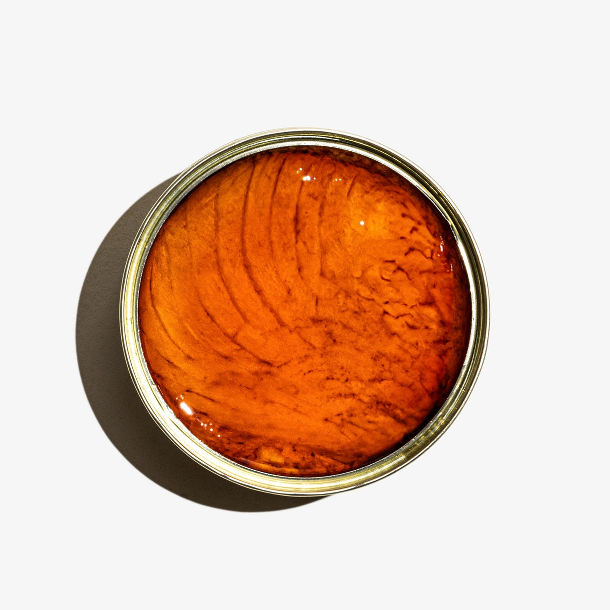 Fishwife Albacore Tuna in Spicy Olive Oil on a neutral background.